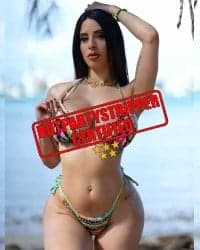 a hot latina stripper in a bikini on the bay of downtown Miami