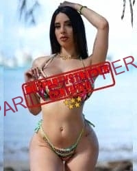 a hot latina stripper in a bikini on the bay of downtown Miami