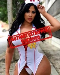a mixed Puerto Rican and Dominican stripper in a nurse costume
