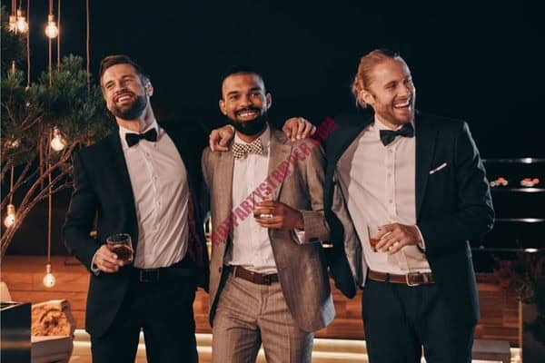 Excited bachelor party group enjoying private entertainment with champagne and city skyline view