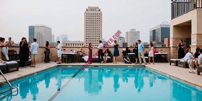 Group enjoying private entertainers at Dallas pool party event in May