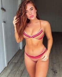 Sasha brunette exotic dancer performing at a Key West house party