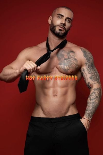 Latino male stripper at private party