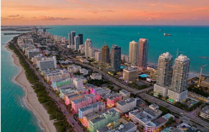 Best Miami Neighborhoods for a Bachelor Party | Hot Party Stripper | Hot Party Stripper Miami skyline aerial view of South Beach and Brickell neighborhoods at night
