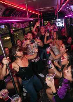 Miami bachelorette party bus with male stripper police costume