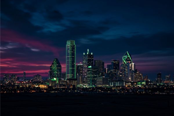 Dallas skyline after dark — book strippers in Dallas, Texas