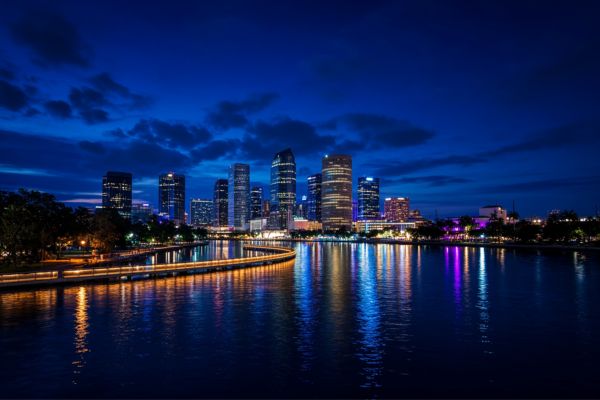 Tampa waterfront at night — book strippers in Tampa, Florida